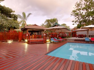 Large, extensive deck connecting the fire-pit, braai-area and kitchen